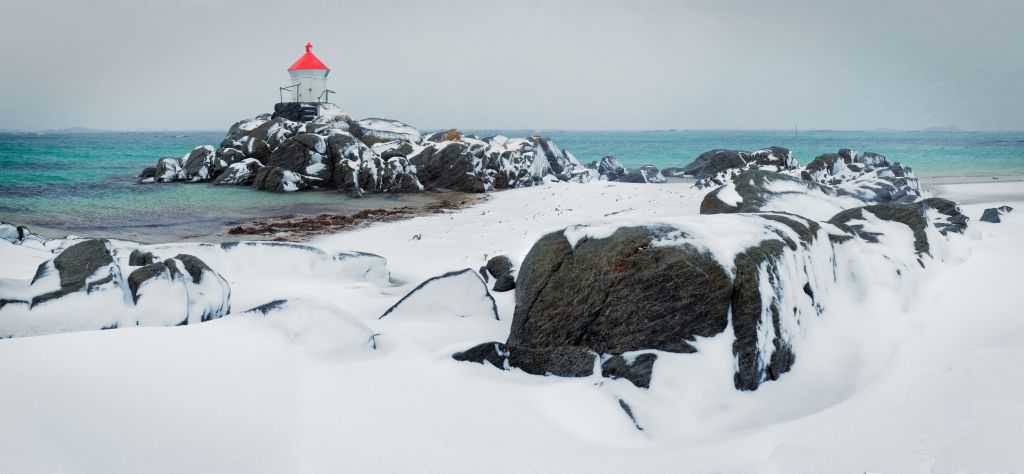 Winter beach with lighthouse, Eggum